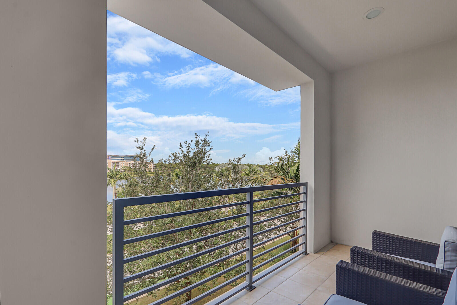 13332 Alton Road Palm Beach Gardens, FL 33418 - Photo 44 of 53 a view of a city from a balcony