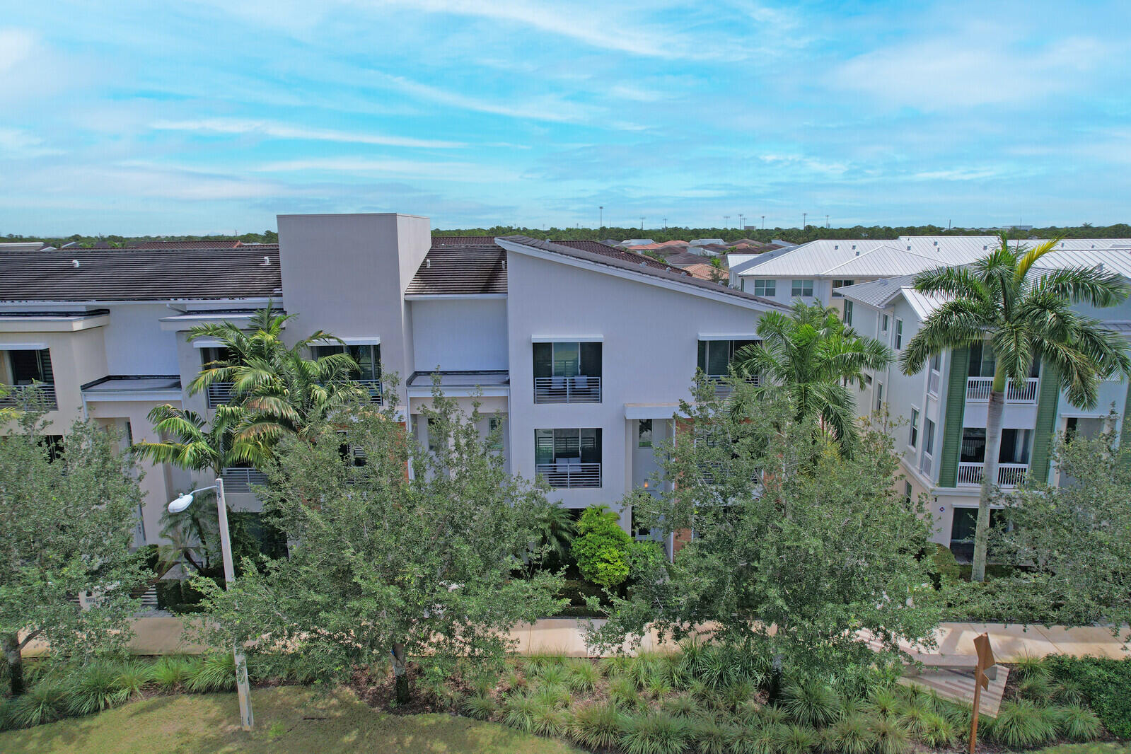 13332 Alton Road Palm Beach Gardens, FL 33418 - Photo 46 of 53 an aerial view of a house with a yard
