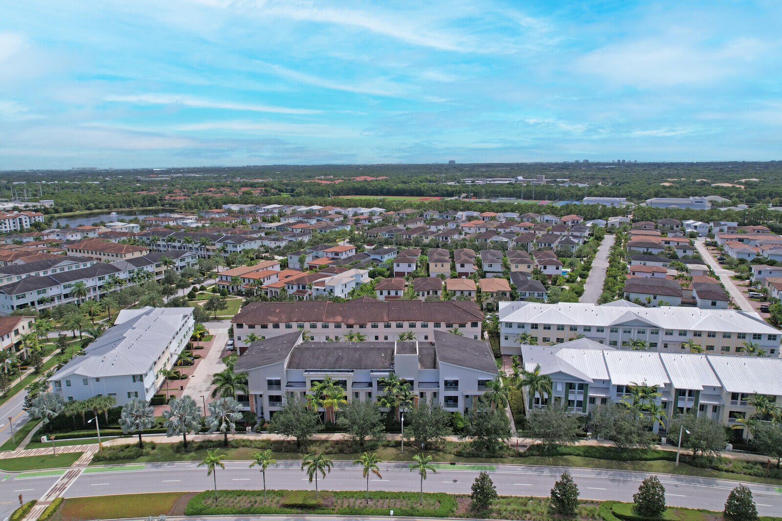 13332 Alton Road Palm Beach Gardens, FL 33418 - Photo 47 of 53 an aerial view of a building with lake view and mountain view in back