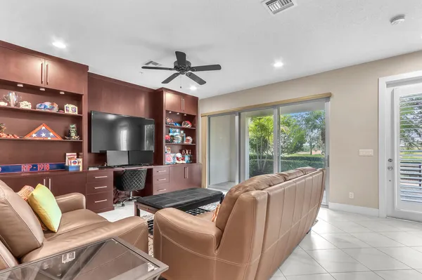 a living room with furniture and a rug