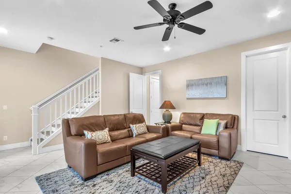 a living room with furniture and a window