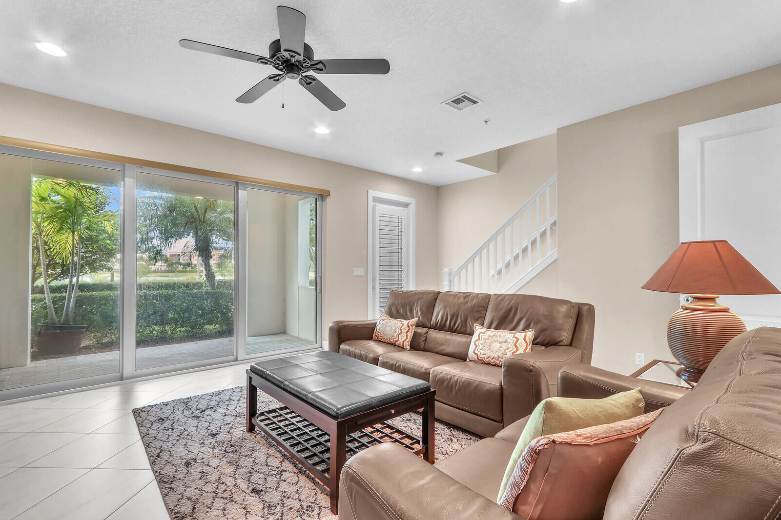 13332 Alton Road Palm Beach Gardens, FL 33418 - Photo 9 of 53 a living room with furniture and a window