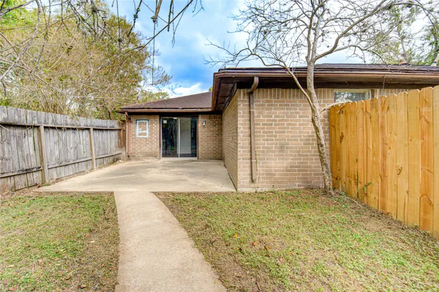 a house with trees in front of it