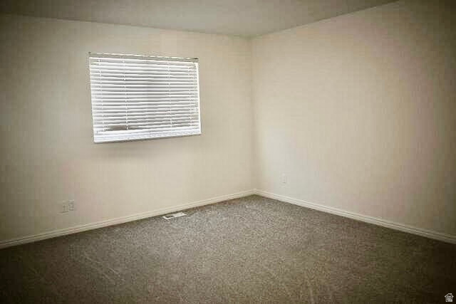 778 North 250 West Springville, UT 84663 - Photo 11 of 16 Unfurnished room featuring dark colored carpet and baseboards