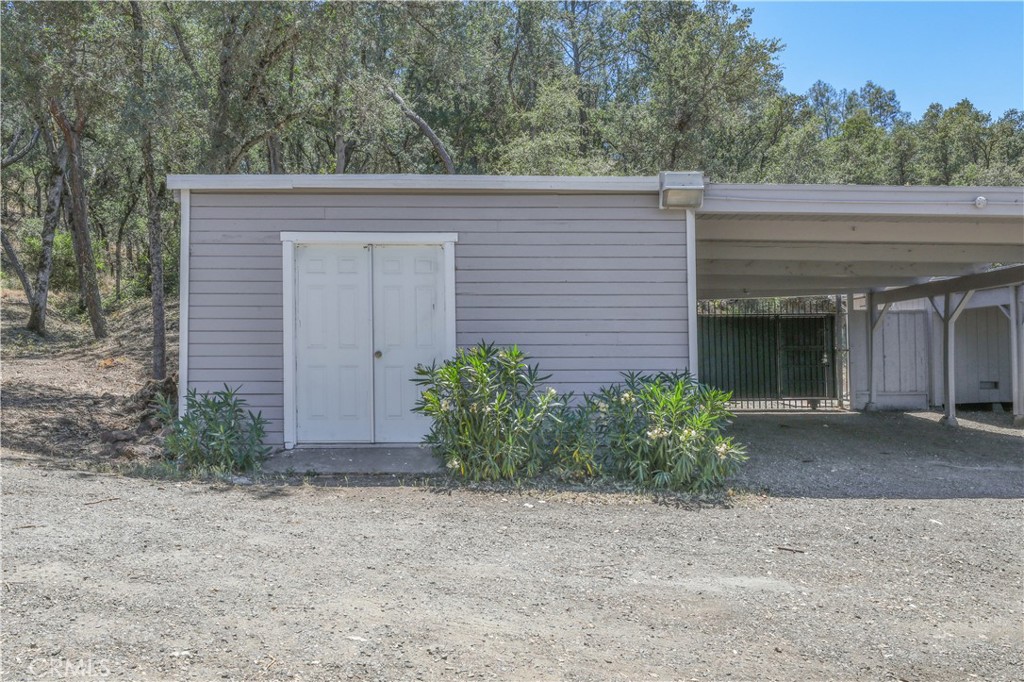 15905 Kugelman Street Lower Lake, CA 95457 - Photo 8 of 75 a view of a house with a yard