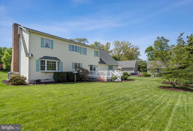 a view of a chairs and table on the wooden floor