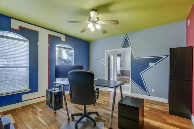 a dining room with furniture and window