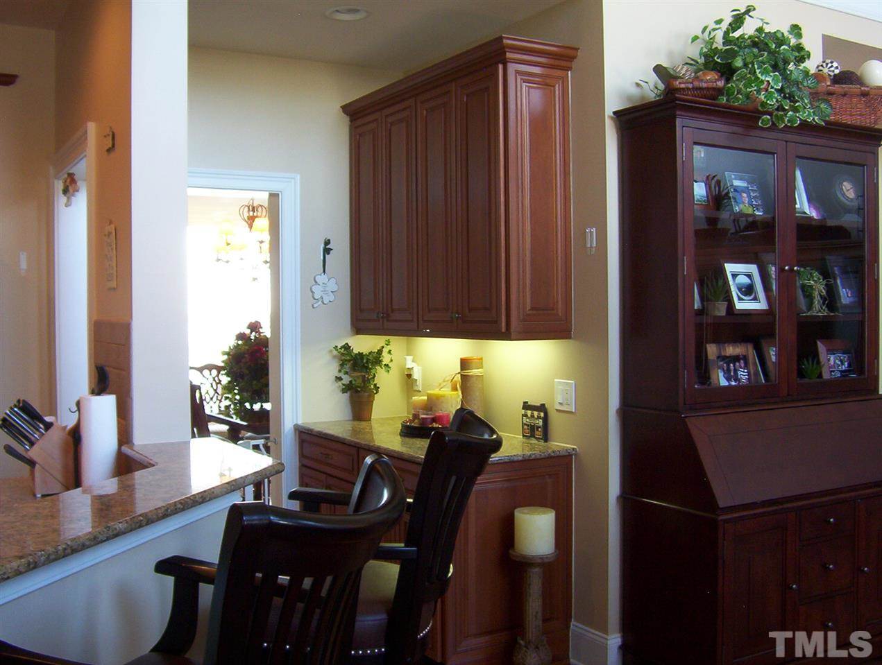 10652 Tarton Fields Circle Raleigh, NC 27617 - Photo 13 of 25 a view of a dining room with furniture