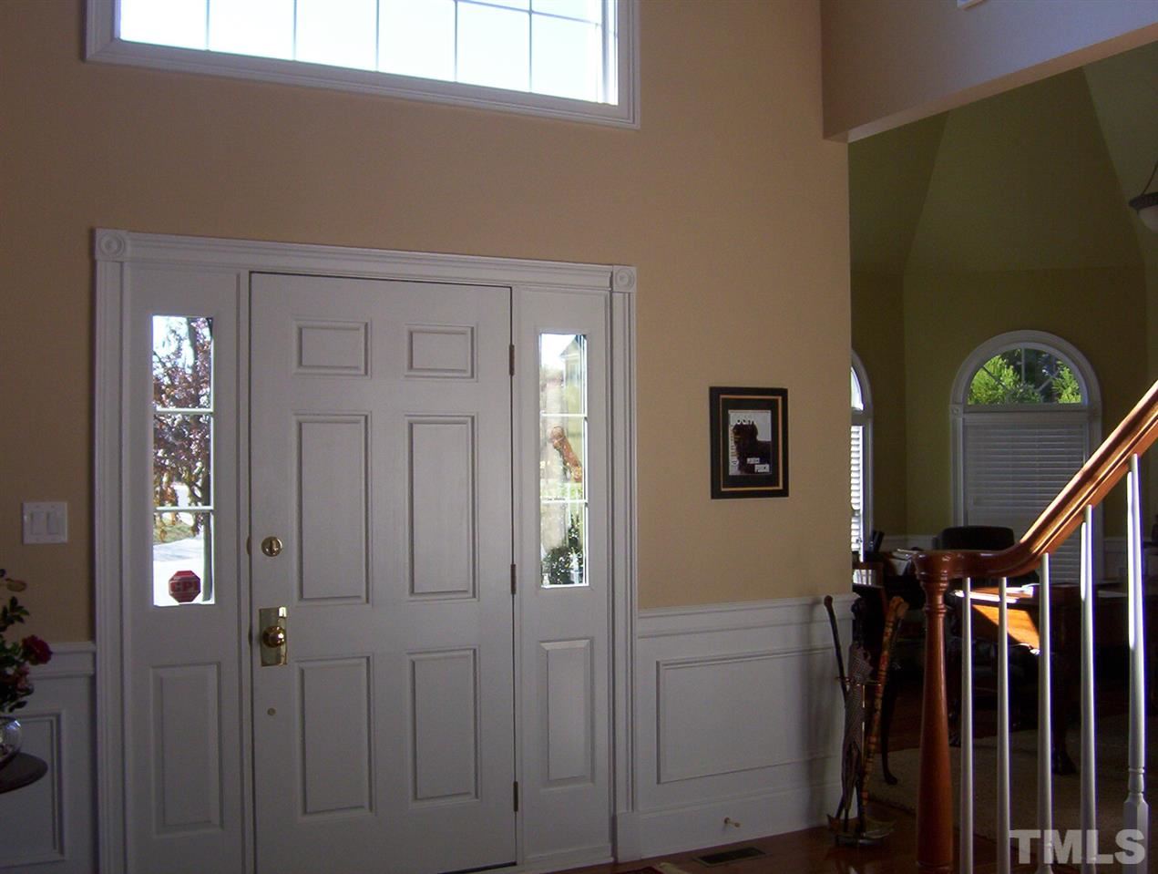 10652 Tarton Fields Circle Raleigh, NC 27617 - Photo 3 of 25 a view of an entryway with a livingroom