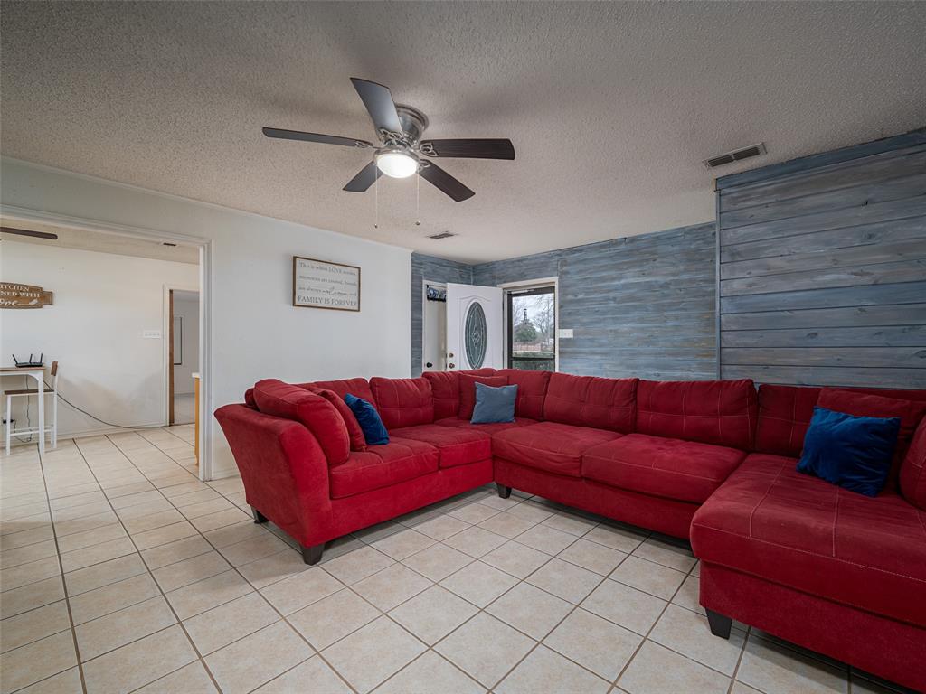 9663 Matise Street Tyler, TX 75706 - Photo 4 of 15 a project room with furniture and a rug