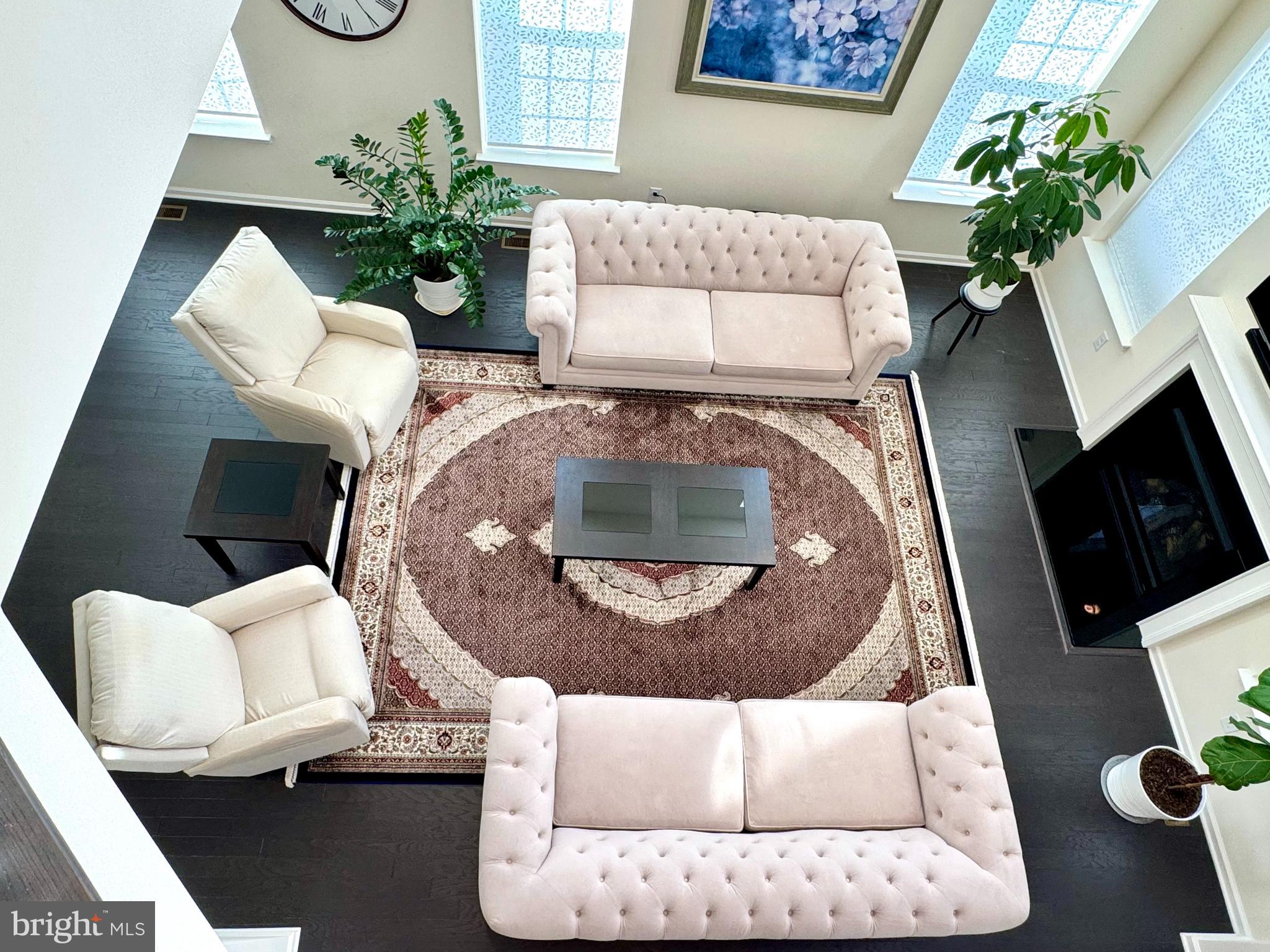 447 Lee Place Exton, PA 19341 - Photo 11 of 31 a living room with furniture and a fireplace