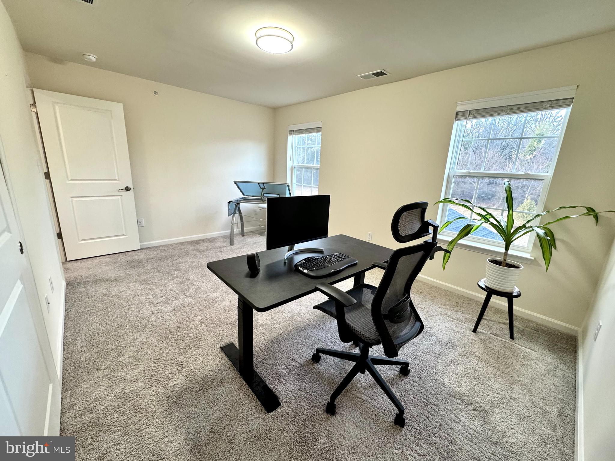 447 Lee Place Exton, PA 19341 - Photo 22 of 31 a view of a workspace with furniture