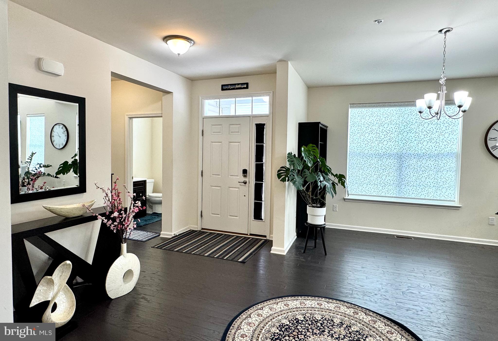 447 Lee Place Exton, PA 19341 - Photo 3 of 31 a living room with furniture and wooden floor