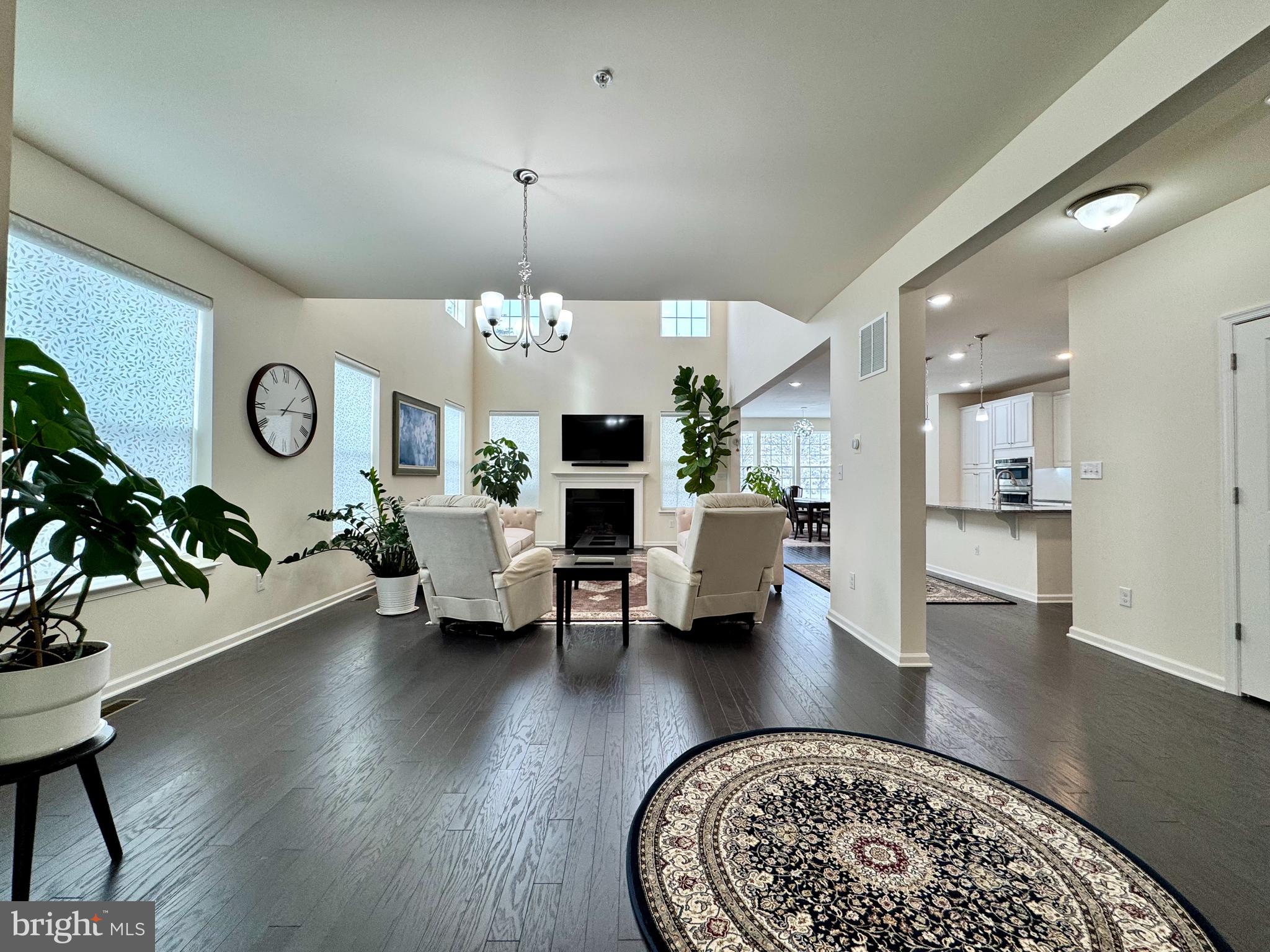 447 Lee Place Exton, PA 19341 - Photo 5 of 31 a living room with furniture or chandelier and a wooden floor