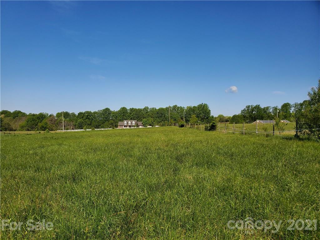 2376 Maple Lee Court Crouse, NC 28033 - Photo 20 of 22 a view of a lake from a yard