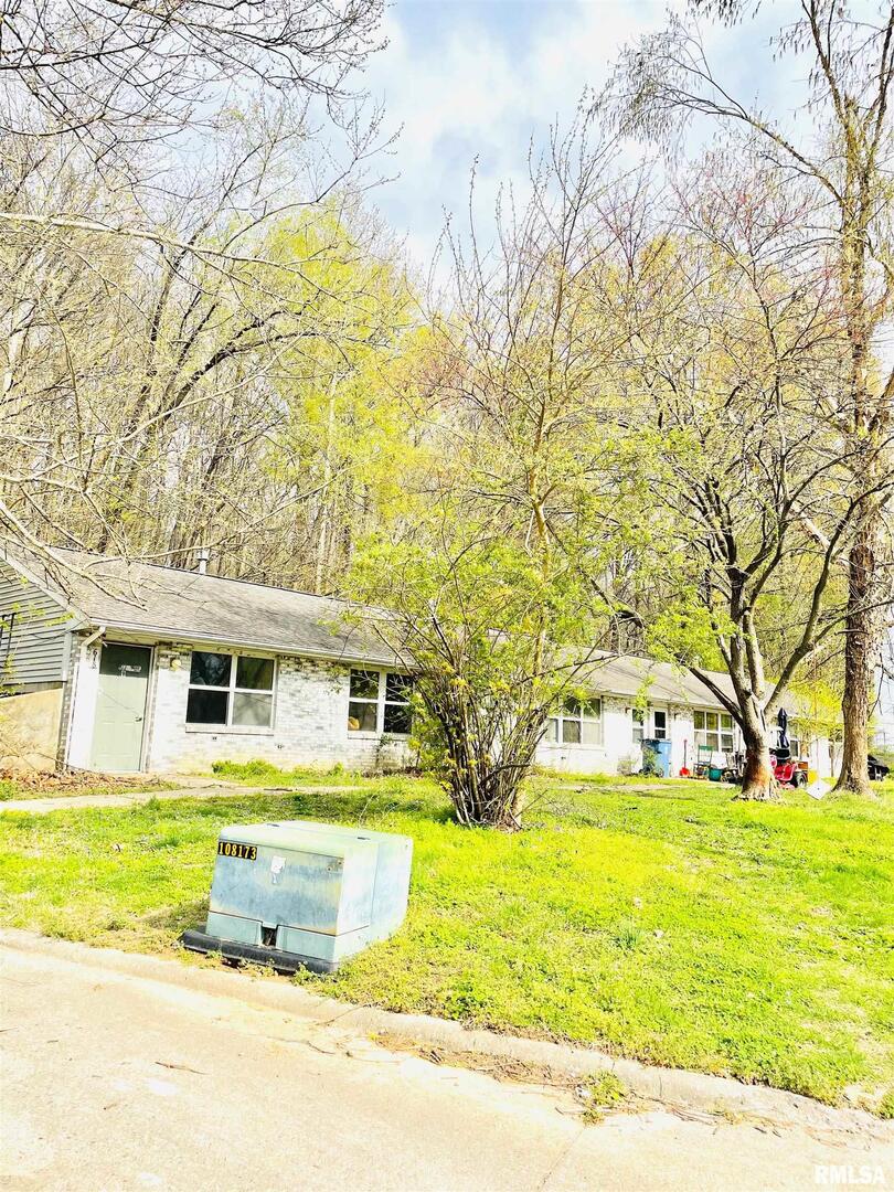 a view of a house with a swimming pool