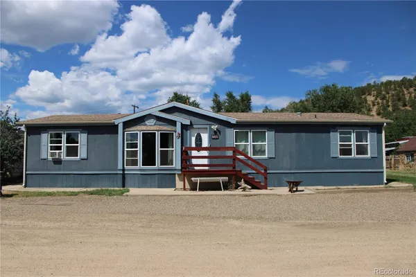 front view of house with a yard