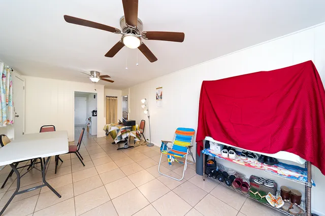 a children room with furniture and a window