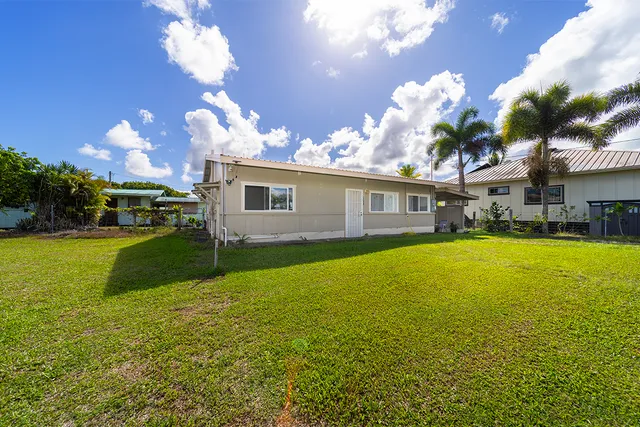a view of a house with a swimming pool