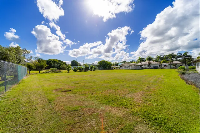 a view of a lake and houses with swimming pool