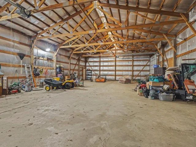 a view of a garage with parked cars