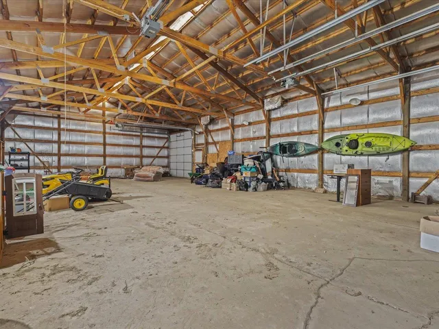 a view of a garage with a table and chairs