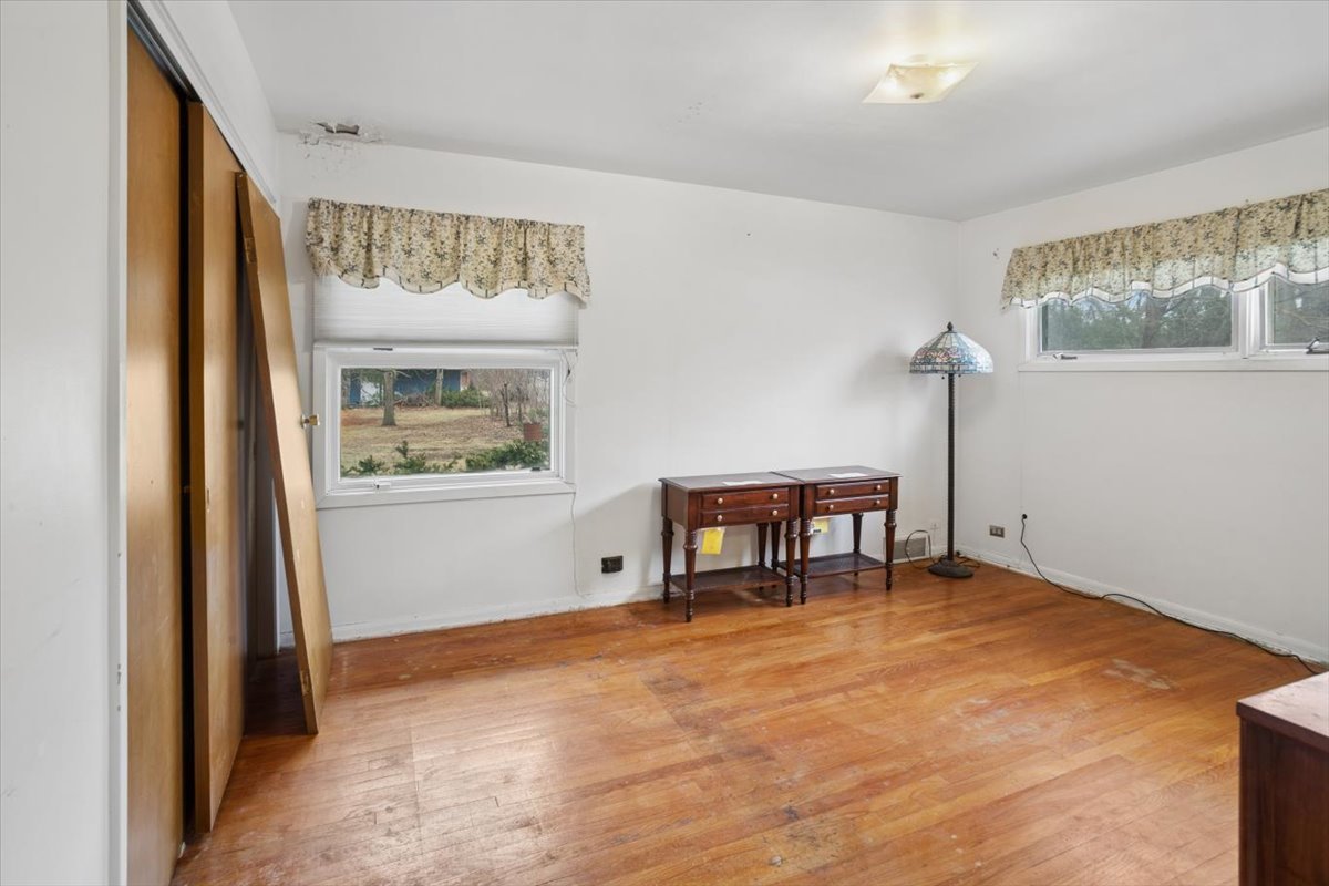 207 Town Acres Lane Roselle, IL 60172 - Photo 13 of 27 a view of an empty room with a window