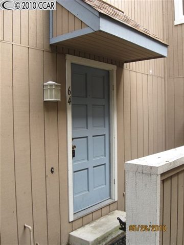 3901 Clayton Road, Unit 64 Concord, CA 94521 - Photo 1 of 1 a view of a house with a wooden door