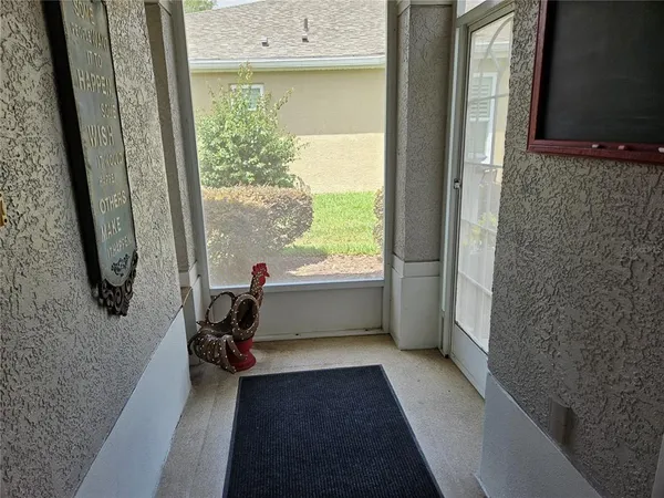 a bathroom with a bathtub and a window