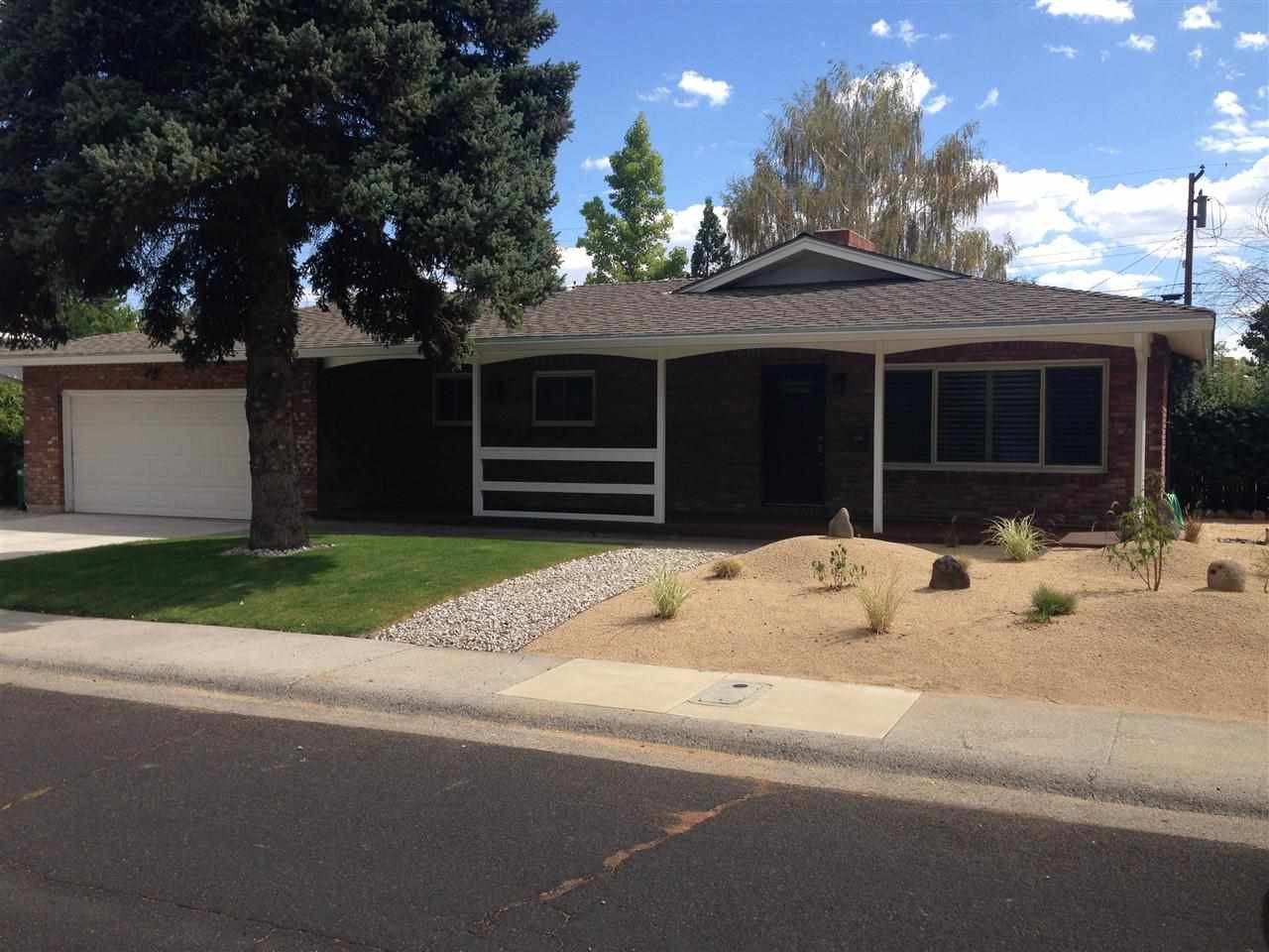 630 Harbin Lane Reno, NV 89509 - Photo 1 of 1 a house with a yard in front of it