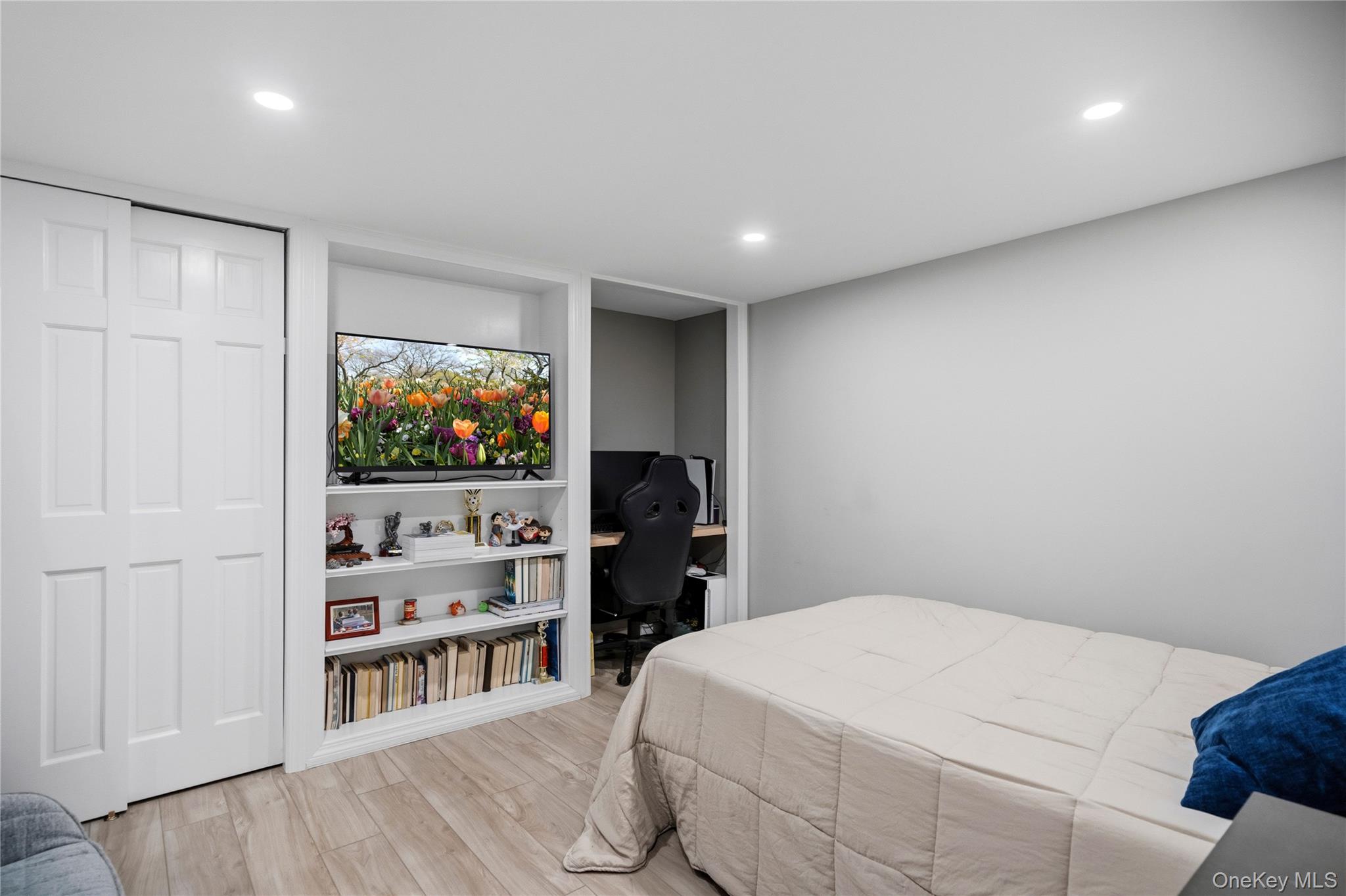 190 Sexton Road West Babylon, NY 11704 - Photo 24 of 28 a bedroom with a bed and a flat screen tv