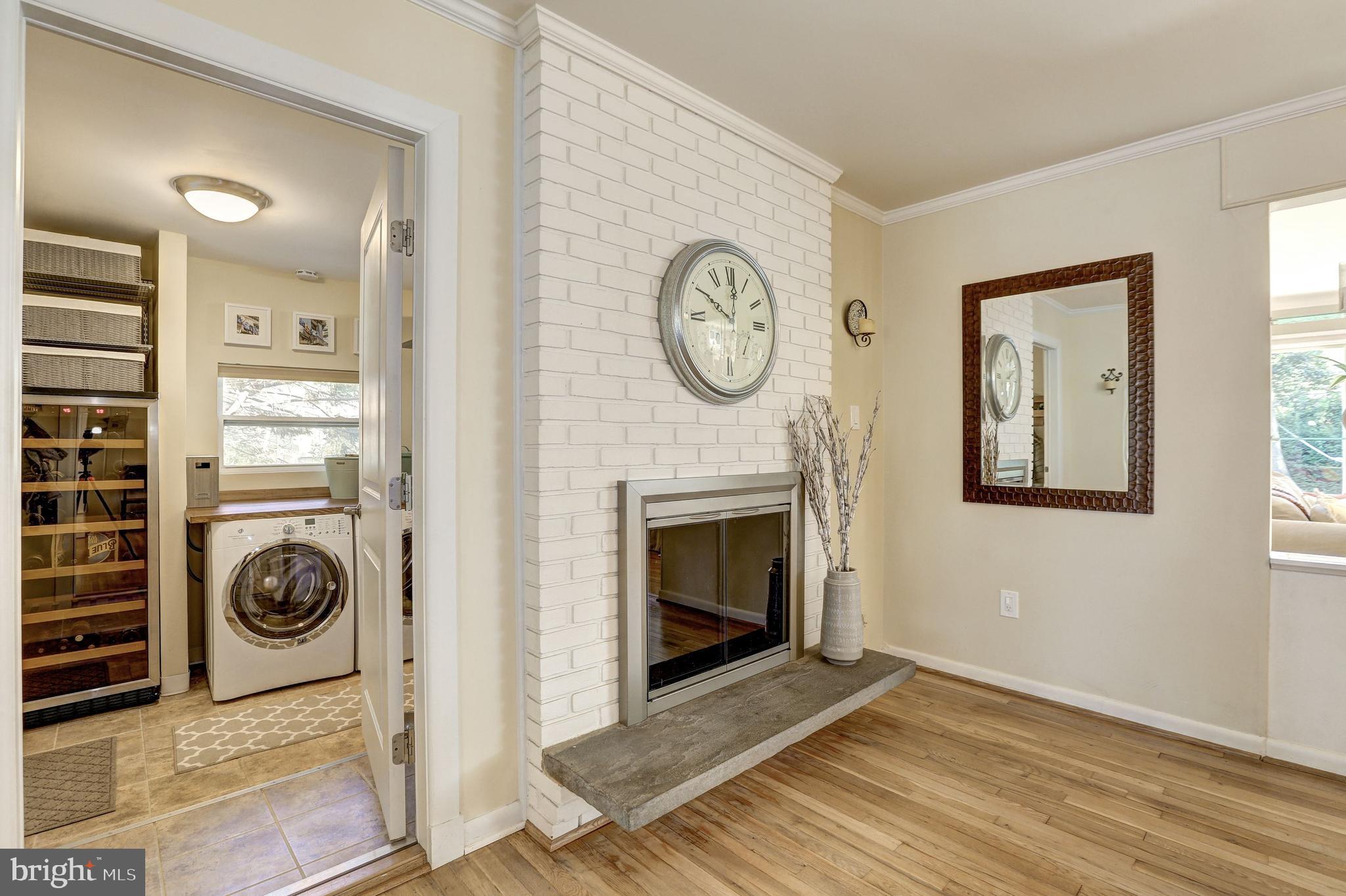 822 Bowie Road Rockville, MD 20852 - Photo 12 of 40 First floor laundry w/80 bottle wine refrigerator.