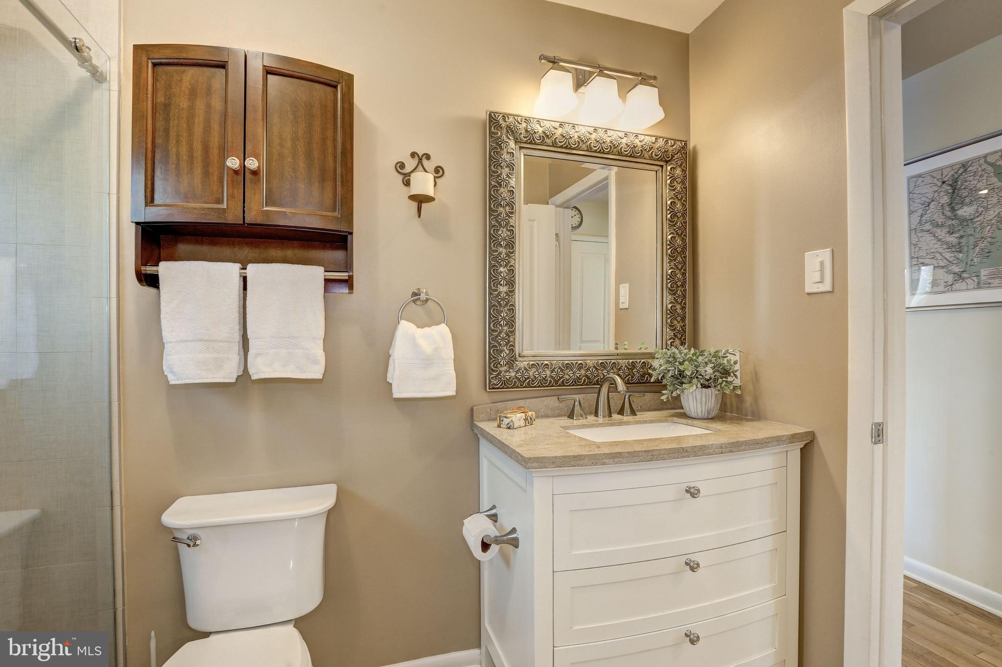 822 Bowie Road Rockville, MD 20852 - Photo 19 of 40 Master bath, dual vanities, shower and spa tub.
