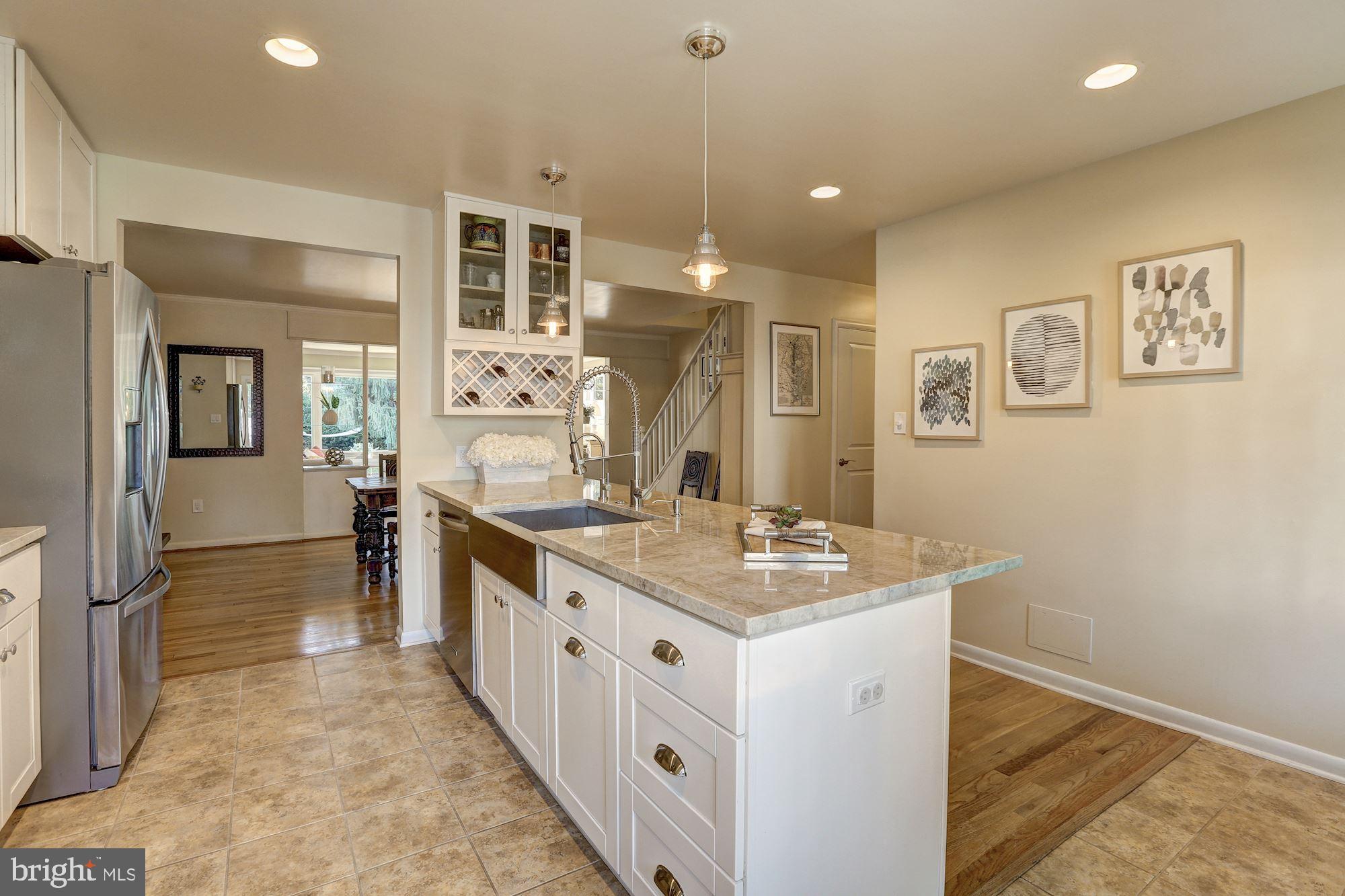822 Bowie Road Rockville, MD 20852 - Photo 7 of 40 Kitchen opens up to the formal dining room.