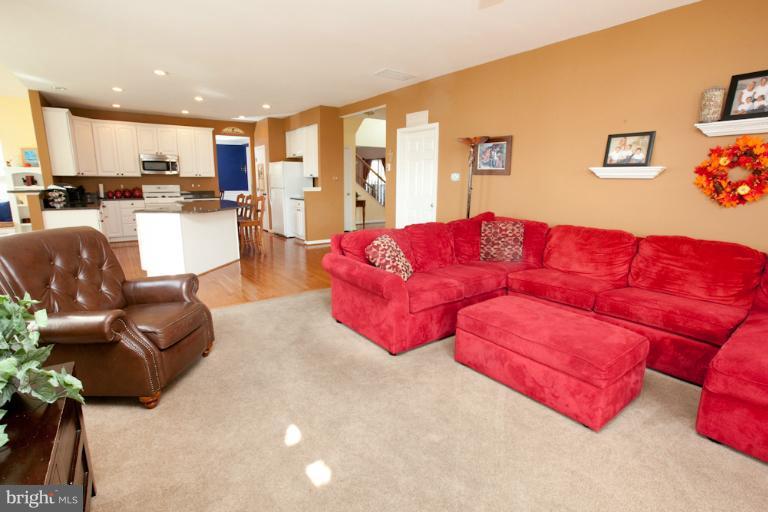 14410 Autumn Crest Road Boyds, MD 20841 - Photo 2 of 25 a living room with furniture kitchen view and a window