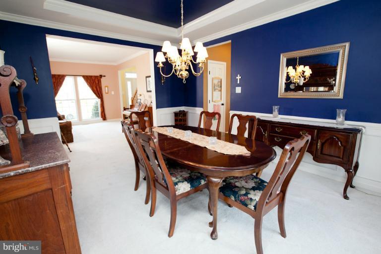 14410 Autumn Crest Road Boyds, MD 20841 - Photo 11 of 25 a view of a dining room with furniture and window