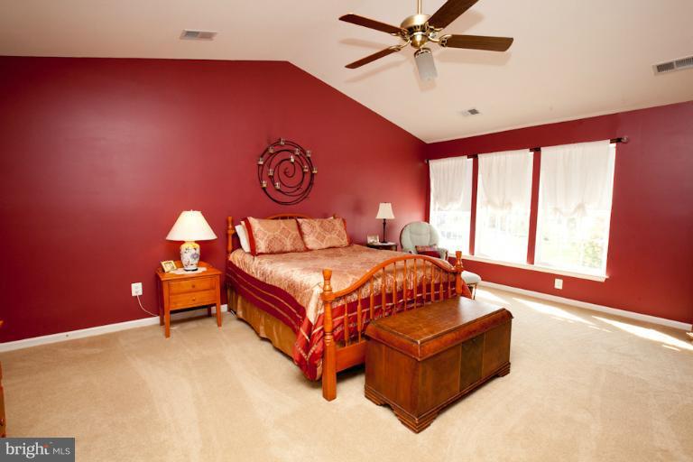 14410 Autumn Crest Road Boyds, MD 20841 - Photo 14 of 25 a bedroom with a bed and window