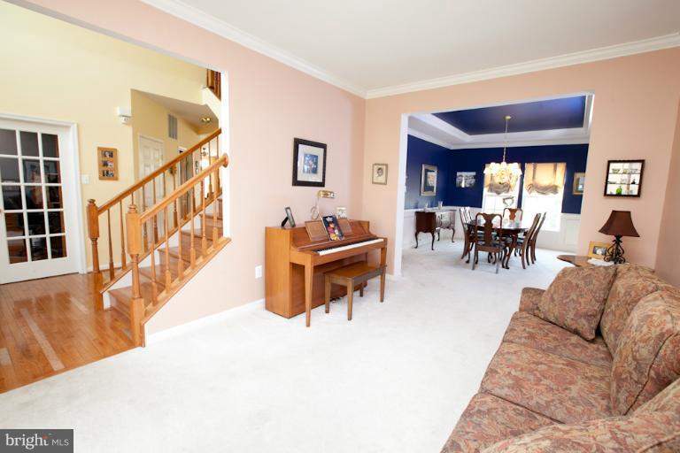 14410 Autumn Crest Road Boyds, MD 20841 - Photo 21 of 25 a living room with furniture and a large window