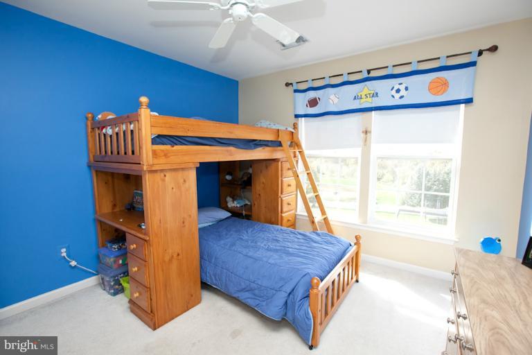 14410 Autumn Crest Road Boyds, MD 20841 - Photo 5 of 25 a bedroom with a bed and a window