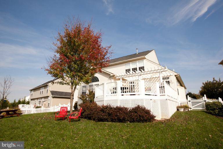 14410 Autumn Crest Road Boyds, MD 20841 - Photo 7 of 25 a view of a house with a yard
