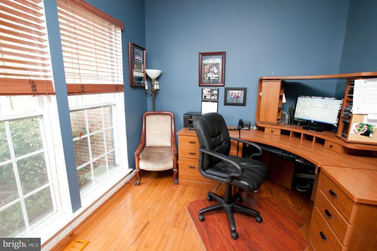 14410 Autumn Crest Road Boyds, MD 20841 - Photo 9 of 25 a view of a workspace with furniture and a window