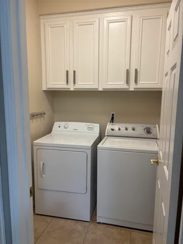 an empty room with a empty space and a window