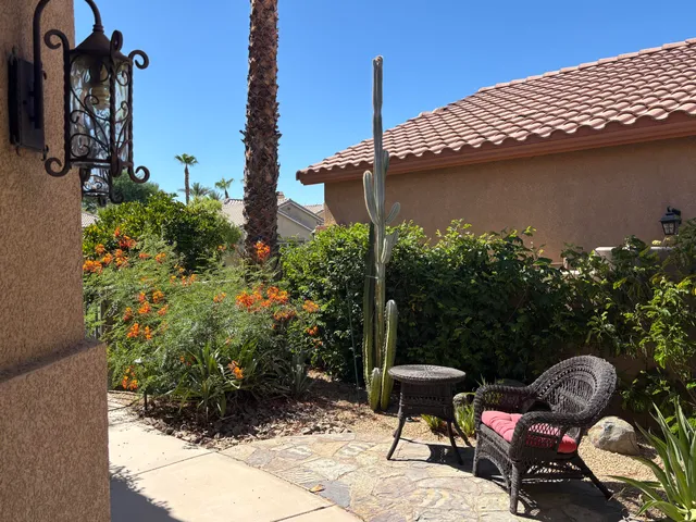 a bathroom with a sink shower and a mirror