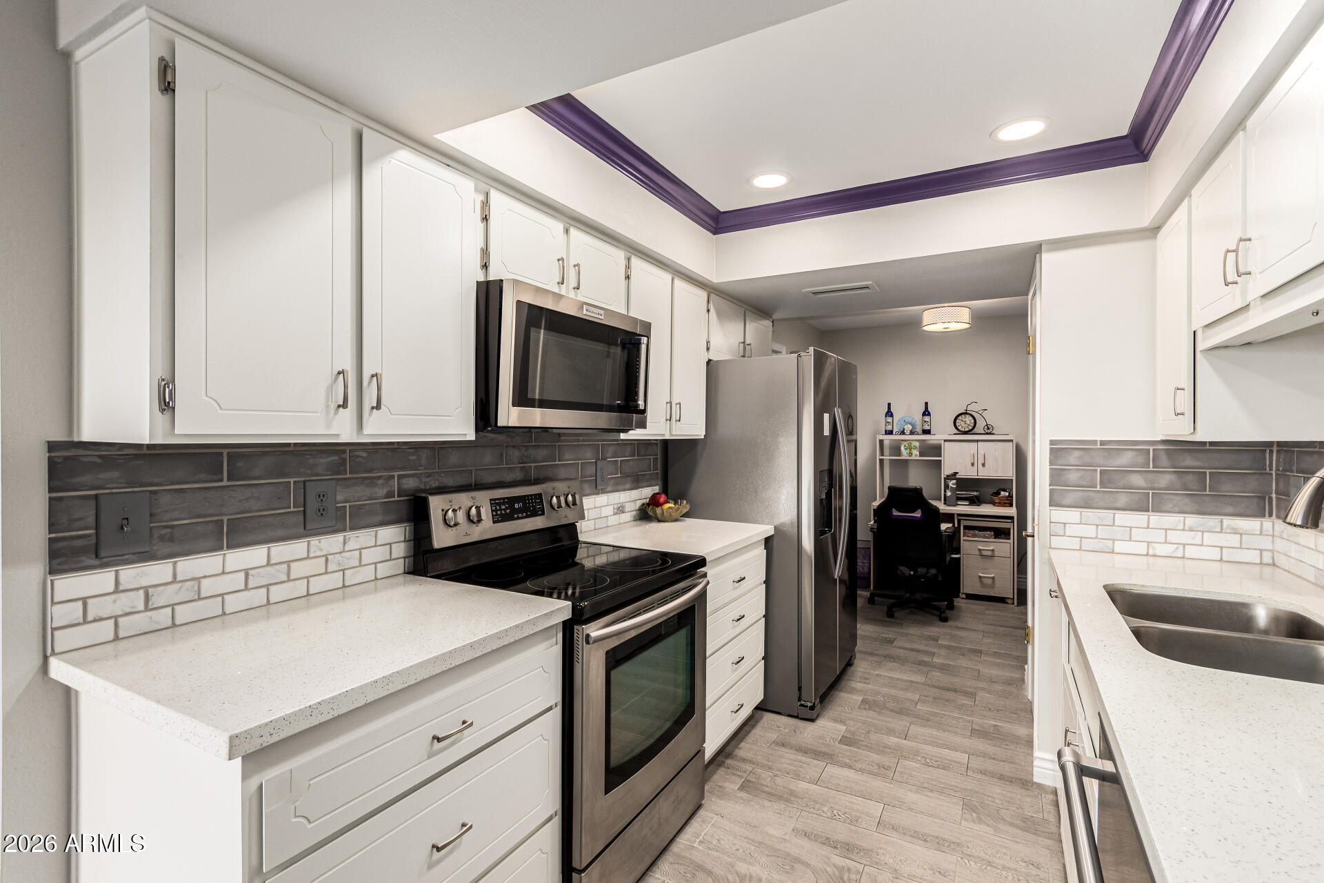 19618 North Star Ridge Drive Sun City West, AZ 85375 - Photo 13 of 37 a kitchen with a sink stove and refrigerator