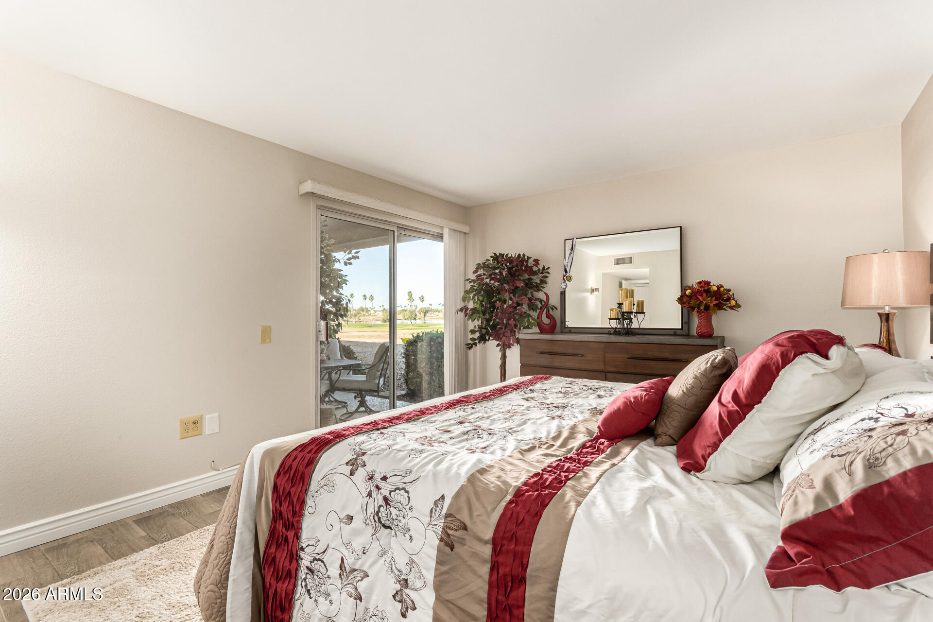 19618 North Star Ridge Drive Sun City West, AZ 85375 - Photo 18 of 37 a bedroom with a bed and a large window