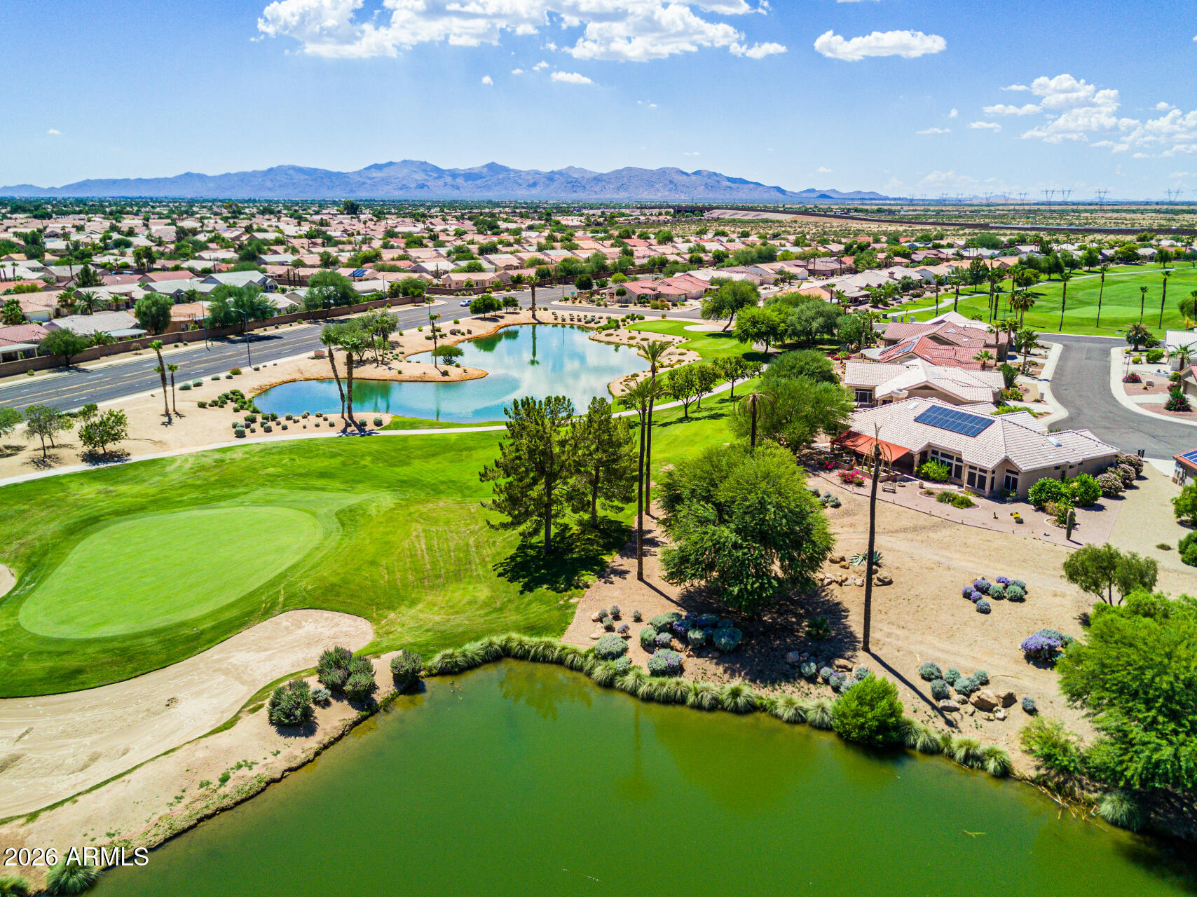 19618 North Star Ridge Drive Sun City West, AZ 85375 - Photo 35 of 37 an aerial view of residential houses with outdoor space