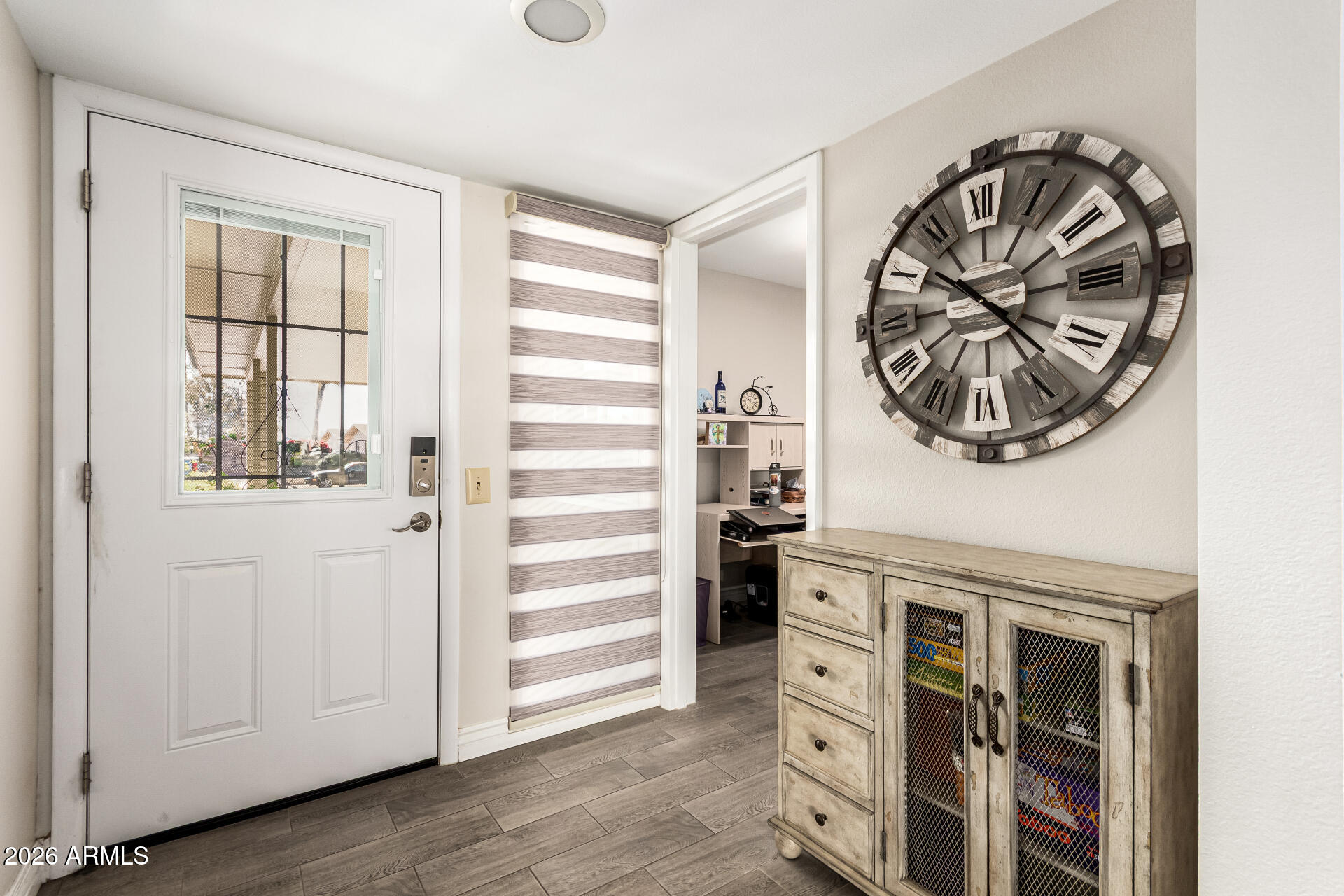 19618 North Star Ridge Drive Sun City West, AZ 85375 - Photo 5 of 37 a view of a hallway with washer and dryer