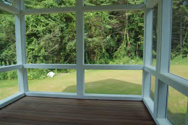 746 Foley Road Sheffield, MA 01257 - Photo 5 of 6 a view of empty room with wooden floor and deck