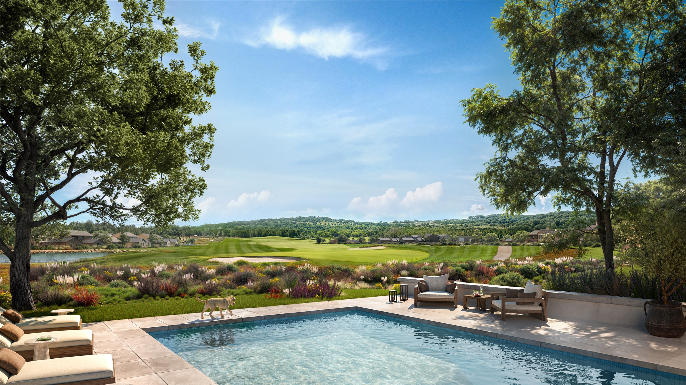 a view of a lake with couches in the patio