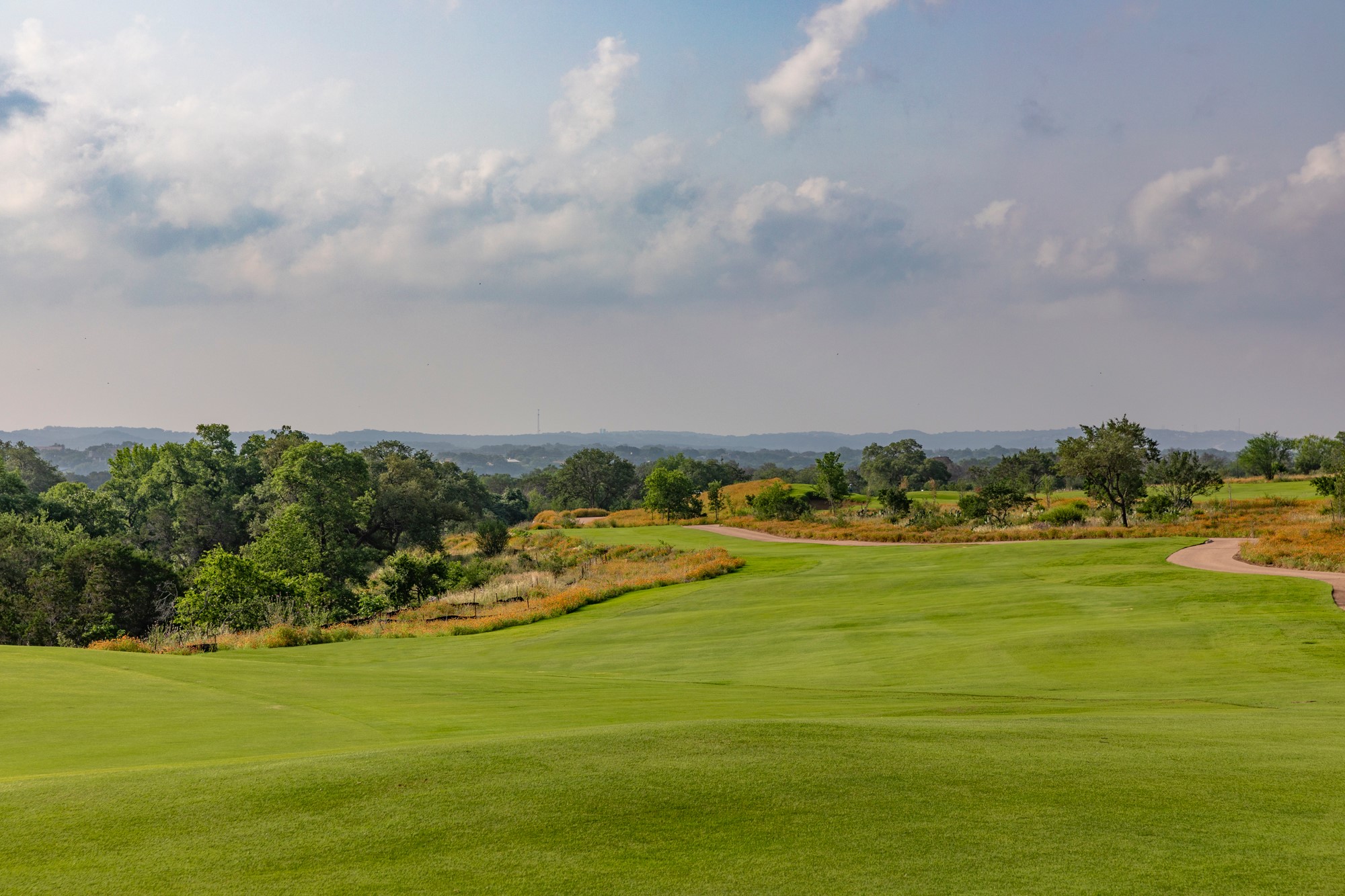 _ Pleasant Knoll Drive Road Spicewood, TX 78669 - Photo 5 of 23 a view of an ocean and mountains